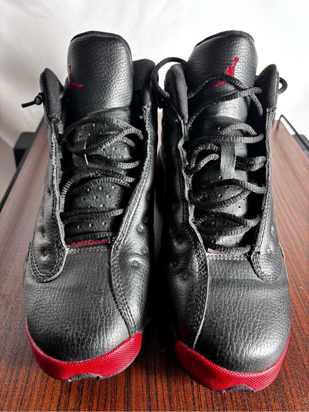 Jordan Women’s Black Sneakers with Red Toe and Red Jumpman